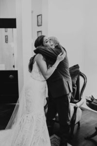 bride embracing father
